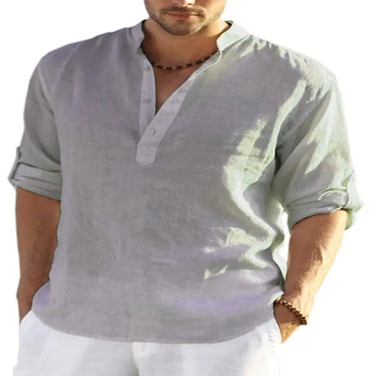 Men's slim fit cotton linen shirt with stand collar and long sleeves in a solid light blue colour.