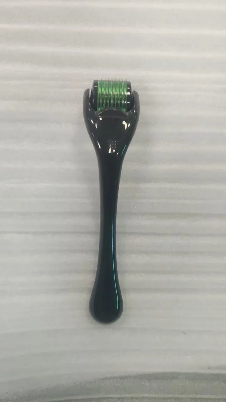 Black handle micro needle roller with purple wheel showing 540 stainless steel needles for dermaplaning