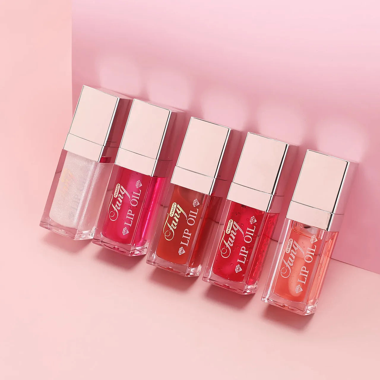 Five colour mint lip gloss tubes with moisturising formula and applicator