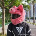 Pink plush cartoon-style protective hood for helmets on a white background.