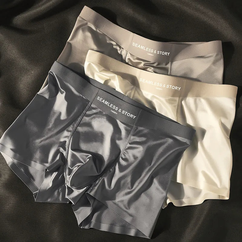 Men's mid-waist ice silk satin underwear in coffee colour showing traceless design