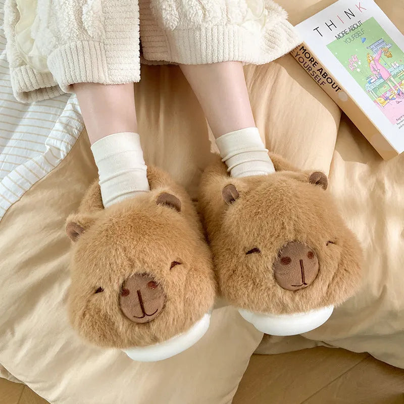 Light brown women's winter slippers with artificial wool lining and cartoon pattern