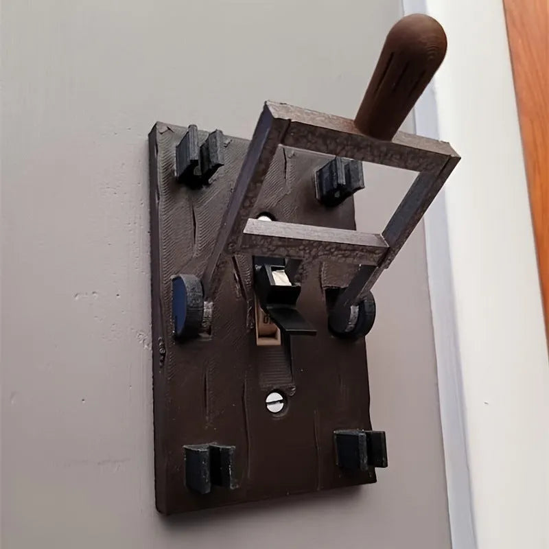 Retro-style mechanical light switch with a decorated plate for exposed wall installation.
