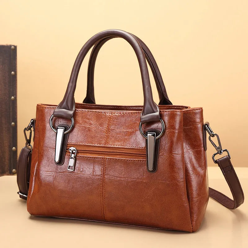 Large capacity shoulder bag in vintage brown with horizontal square design and multiple internal compartments