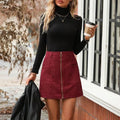 Women's high waist short skirt with stitching detail and side zipper in one of four colours.