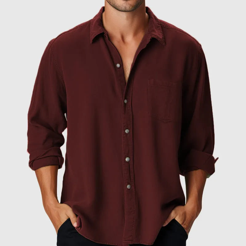 Men's loose fit long sleeve beach shirt with stand collar on a mannequin.