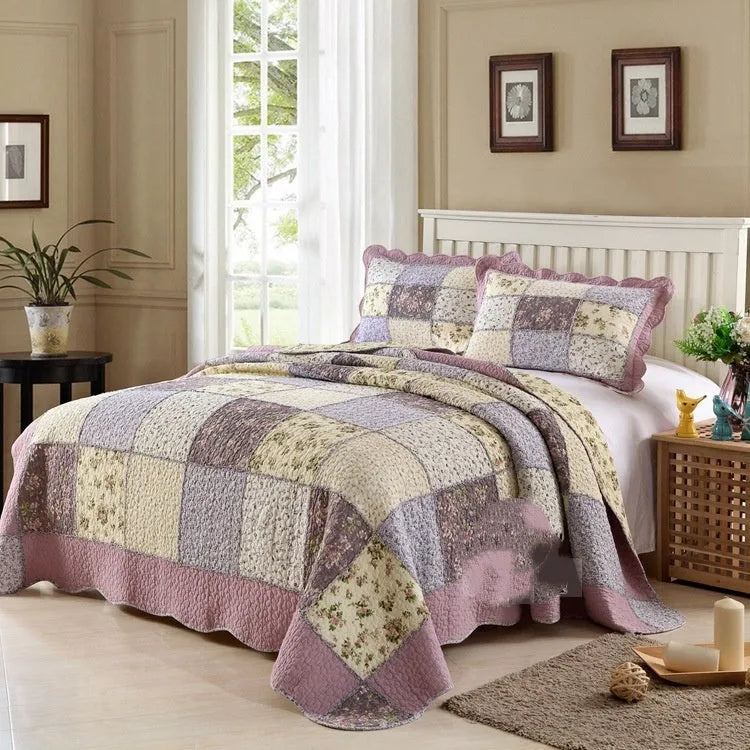 Pure cotton quilted bedspread and pillowcase set in a chosen pattern, laid flat on a bed.