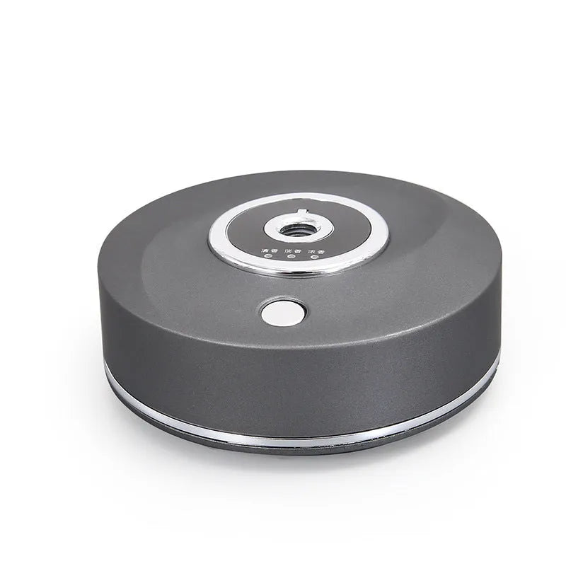 USB-powered vehicle mounted aromatherapy machine in black plastic with anti-slip pad