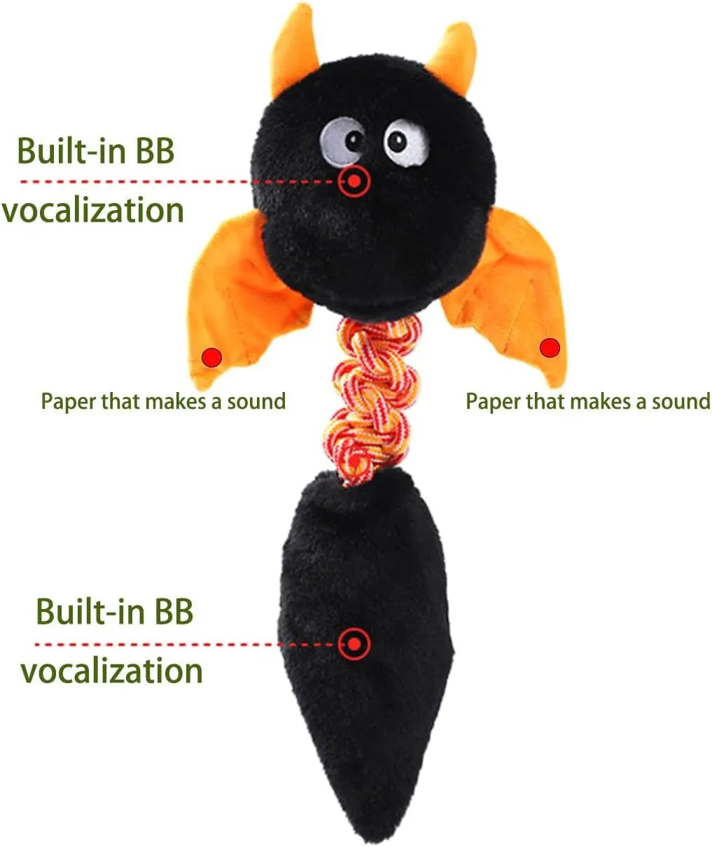 Large plush dog toy in red with cartoon design, featuring a rope knot and suitable for aggressive chewers