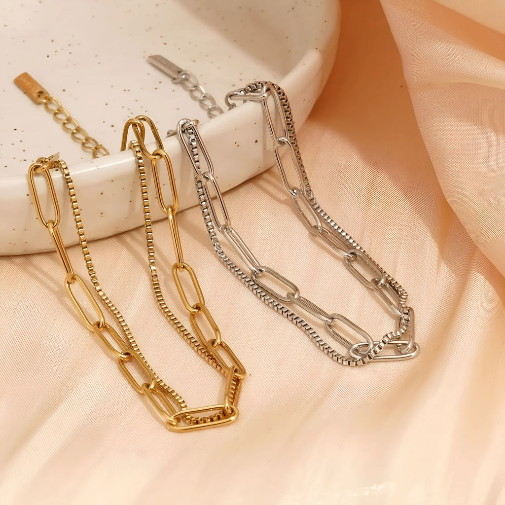 Women's double layer stainless steel bracelet with geometric design in gold or silver finish