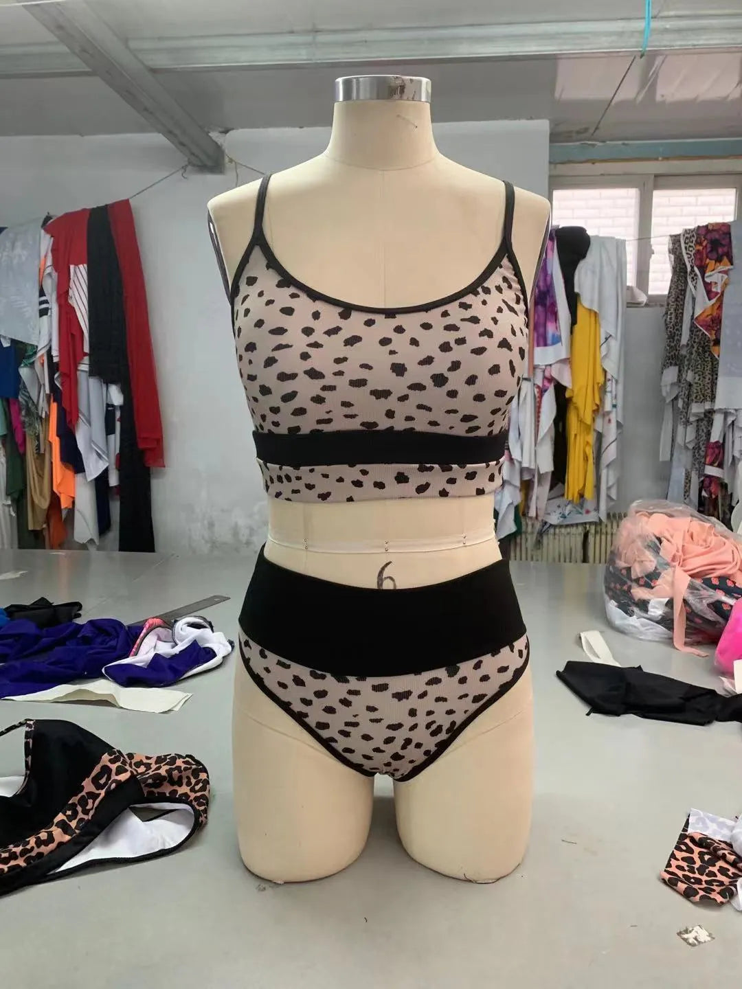 Women's high waist split bikini swimsuit in leopard print or white colours