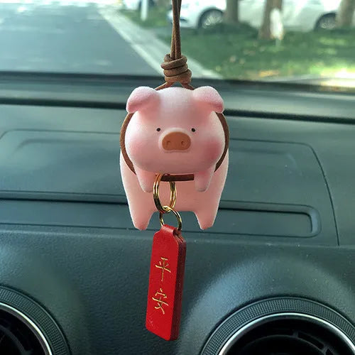 Cute cartoon pig resin figurine designed as a car dashboard decoration accessory.
