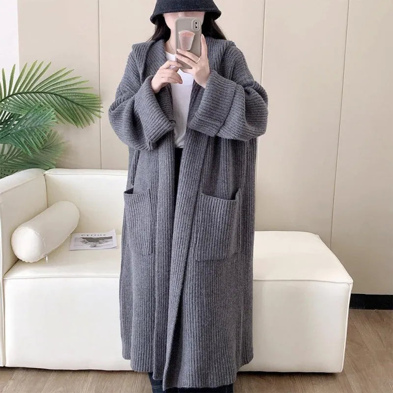 Women's loose hooded cardigan coat in beige with raglan sleeves and extended length
