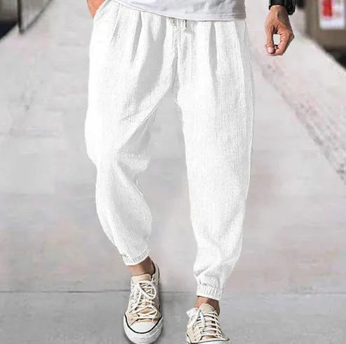 Men's loose-fit cotton trousers with elastic ankle cuffs in multiple colour options