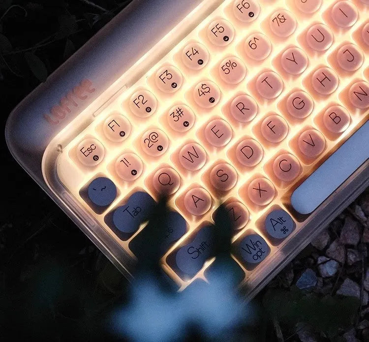 Liquid foundation wireless mechanical keyboard bundle with calculator, light, and mouse on office desk