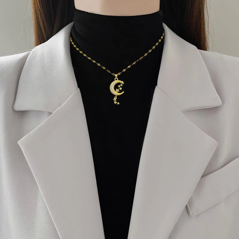Moon tassel necklace with geometric chain and copper pendant on stainless steel