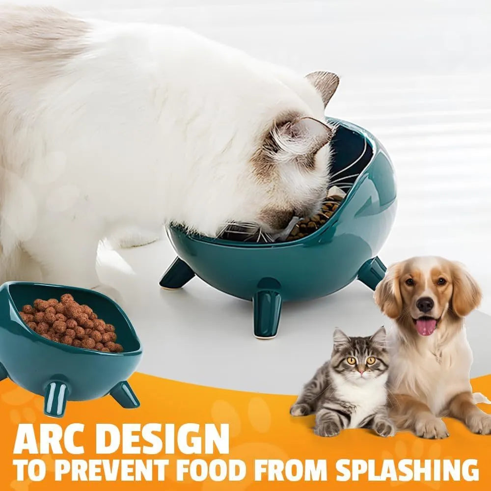 Green ceramic cat food bowl with four-leg stability base on wooden floor