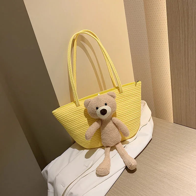 Cotton and linen woven bag with dumpling shape design and double shoulder straps in six colour options