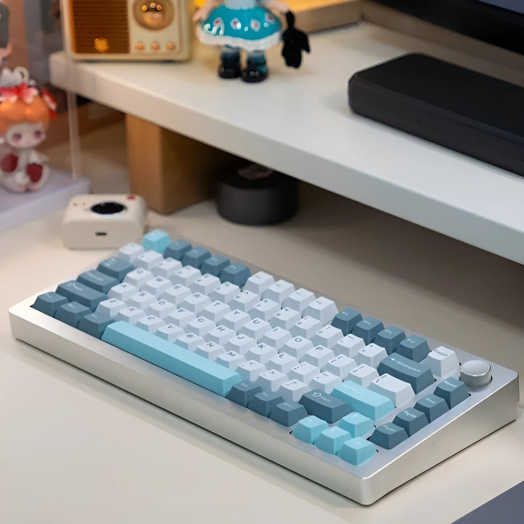 Heiji Snake aluminum mechanical keyboard kit with key puller and USB receiver on dark surface