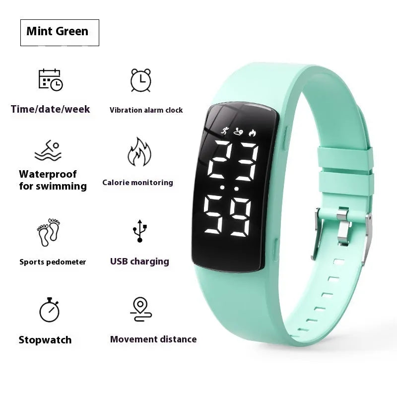Vibration alarm clock watch with LED display on silicone strap showing multiple colour options