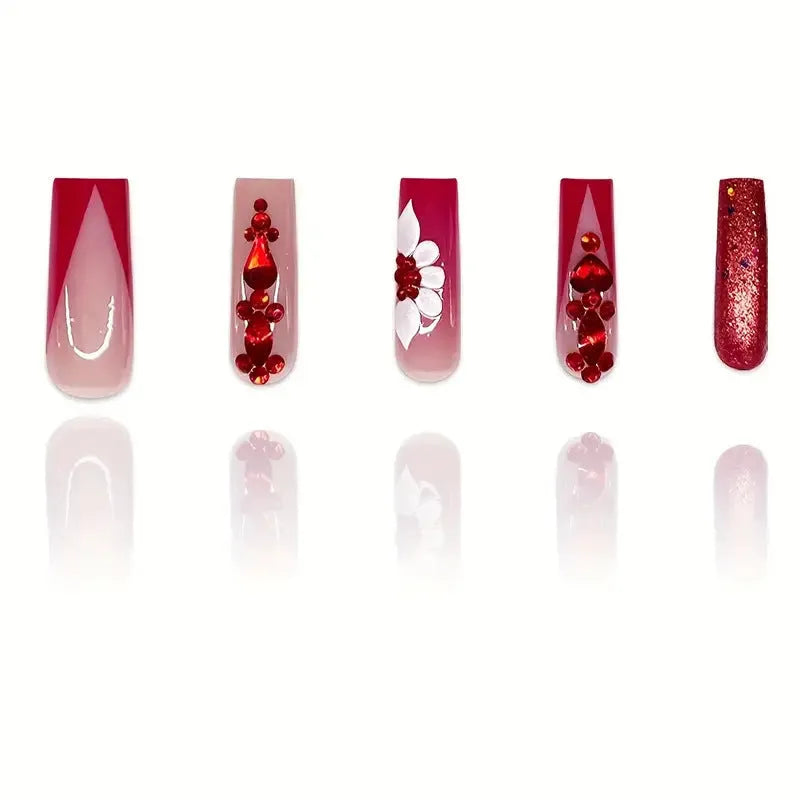Flower-patterned artificial nails with red diamond accents in European square long shape
