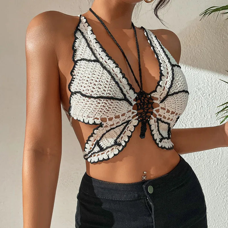 Women's black and white classic bikini swimsuit with matching top on mannequin