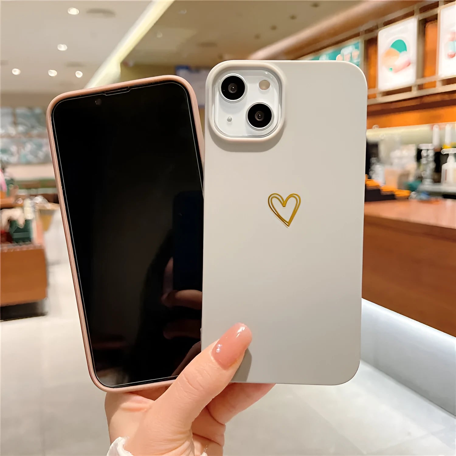 Soft grey silicone iPhone case with a simple hot stamping love cartoon design on the back.