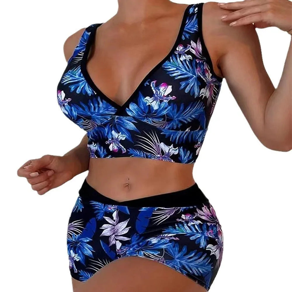 Women's two-piece swimsuit set with sleeveless top and printed boxer-style briefs in multiple colours.