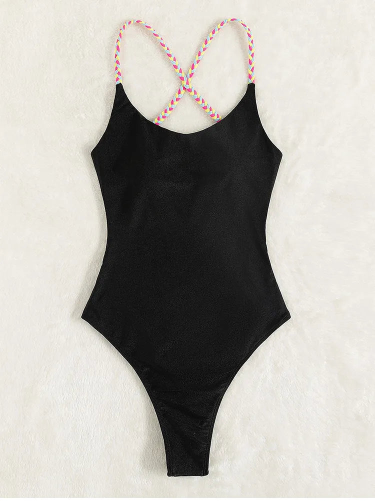Black backless one-piece swimsuit for women made from nylon fabric.
