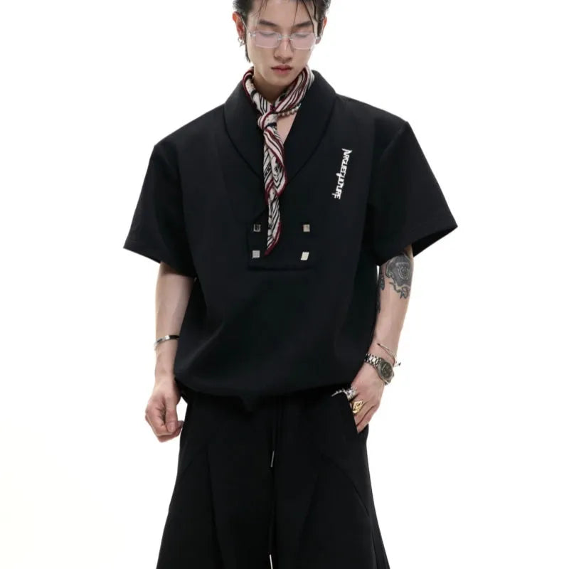 Men's dark grey cotton sports suit with V-neck jacket, padded shoulders, metal embellishments and matching shorts