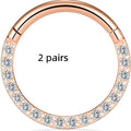 Stainless steel seamless nose rings showing steel, gold, rose gold, and black electroplated finishes with round design