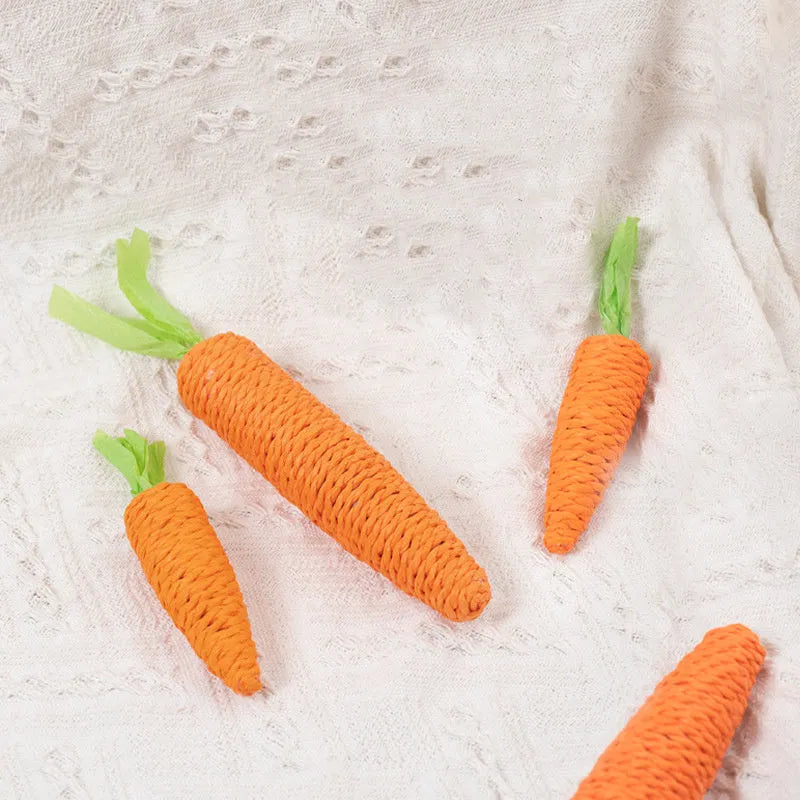 Multipack of cat toys including paper carrots, jingling stones, cat sticks, and tooth grinding sticks in two size options