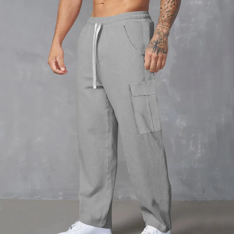 Men's corduroy cargo trousers in straight-leg design with drawstring waist available in multiple colours