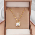 Gold tone geometric quadrilateral pendant necklace with inlaid zircon stones on a water wave chain.