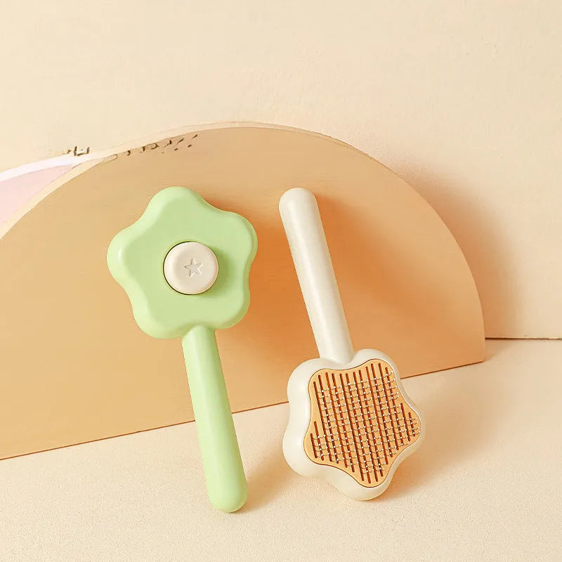Green self-cleaning cat grooming comb with stainless steel needles and four adjustable comb types