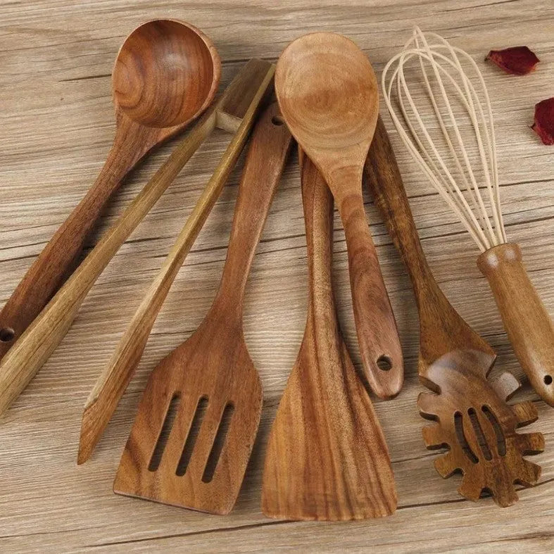 7-piece wooden cooking utensil set showing spoons and spatulas with non-slip handles