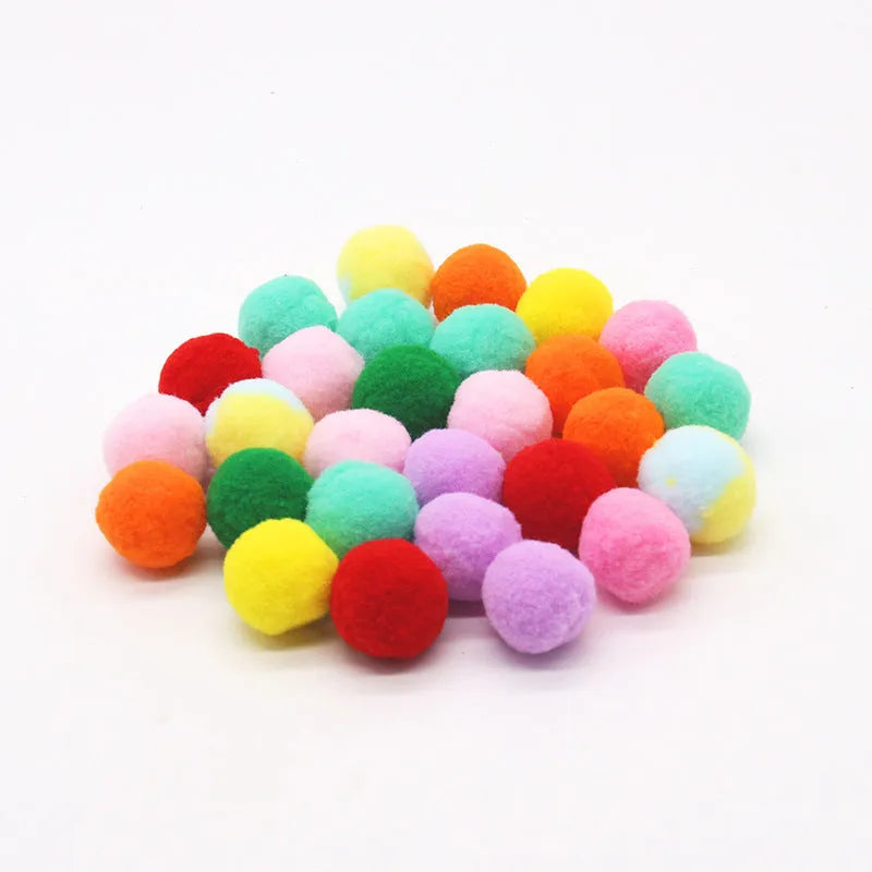 Pet toy launcher gun with assortment of soft plush balls for dog fetching games