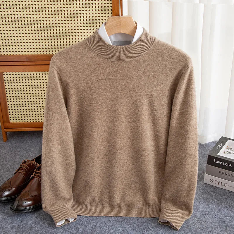 Man wearing a loose-fit half-collar wool sweater in a dark colour, showcasing the knitted texture and neckline design.
