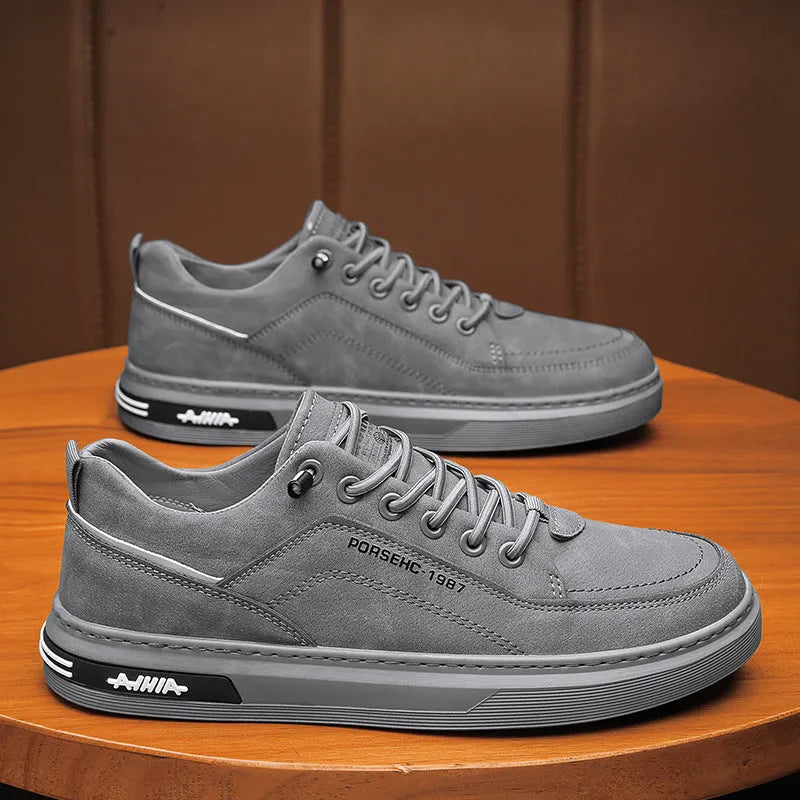 Men's black waterproof work shoes with artificial PU upper and rubber sole, low-top round toe design