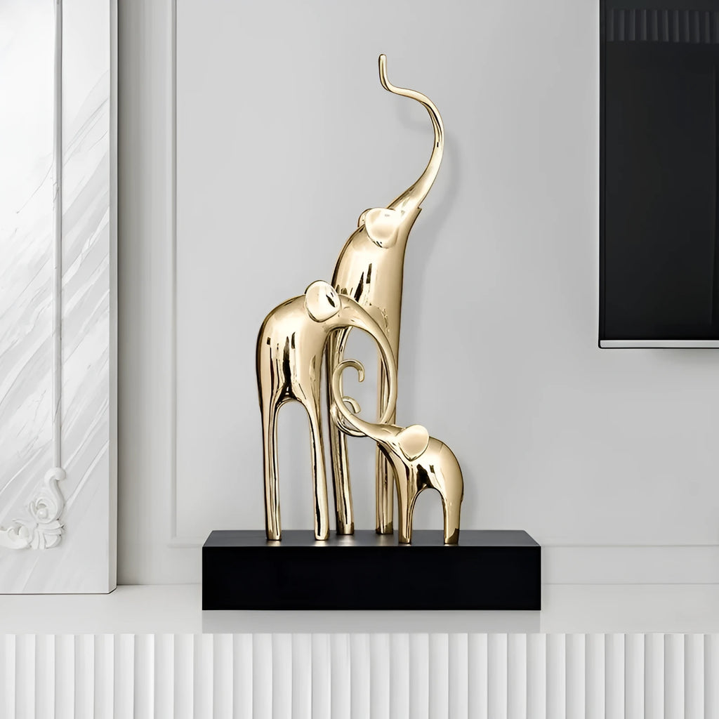 European style resin elephant decorative ornament in bright gold finish displayed on wooden surface