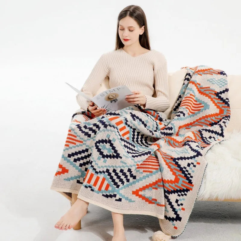 Bohemian-style acrylic sofa blanket with tassel edges in geometric pattern or solid colour options