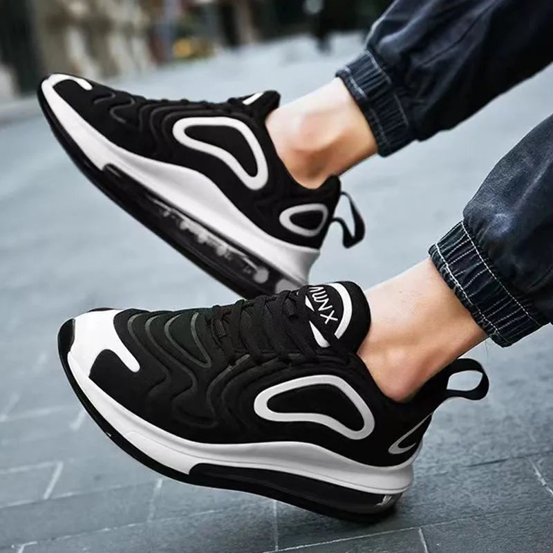 Men's black casual sneakers with a thick sole and lace-up design.