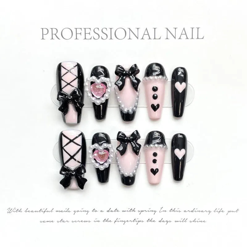 Black peach heart hand-painted false nails with cat's eye effect in four size options