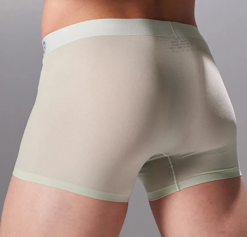 Men's antibacterial seamless sports underwear in four colours: black, blue, green, and silver.