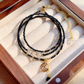 Women's handmade multi-layer bracelet with blue sand stone beads on three interlocking rings