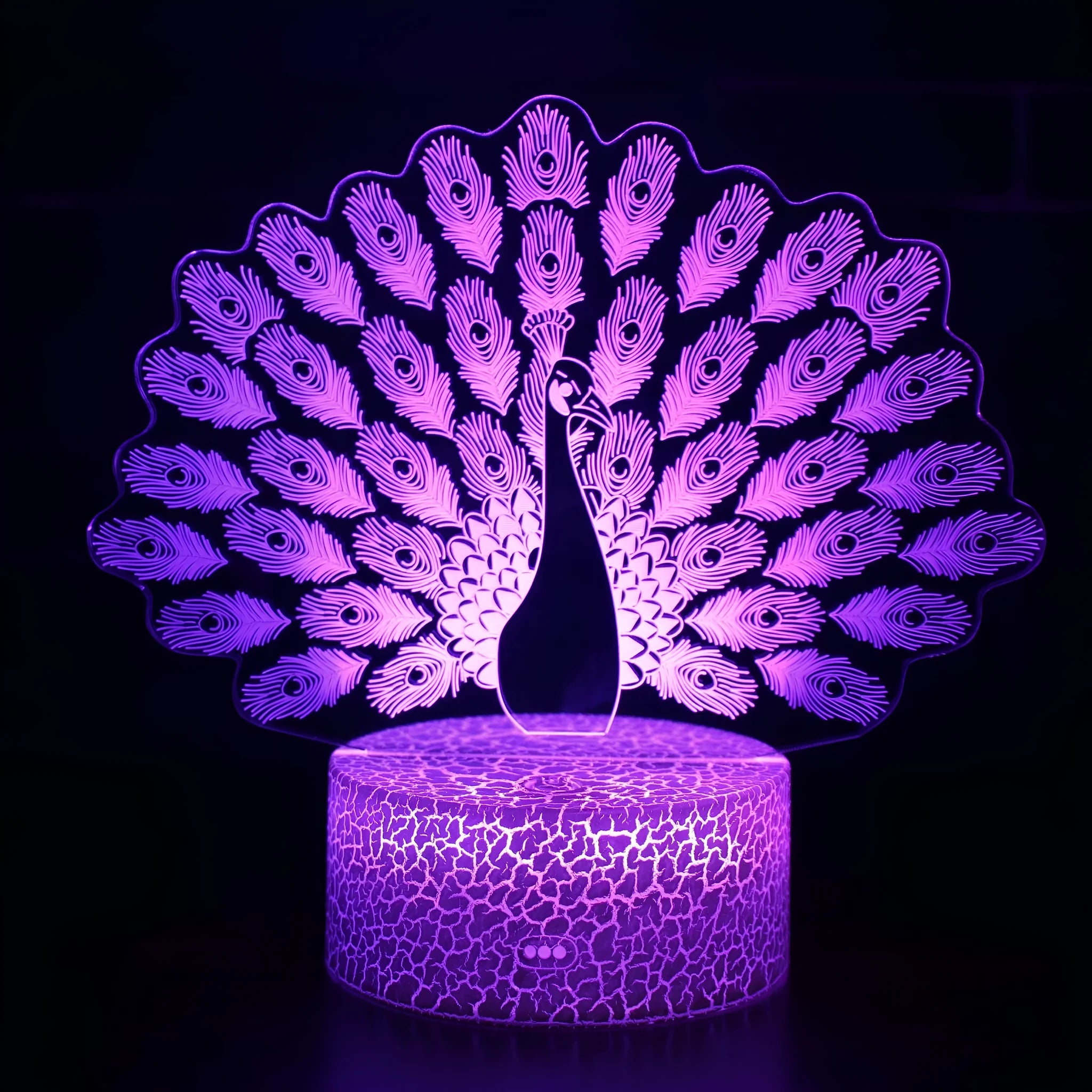 Colourful 3D acrylic USB table lamp with touch control on a wooden desk.