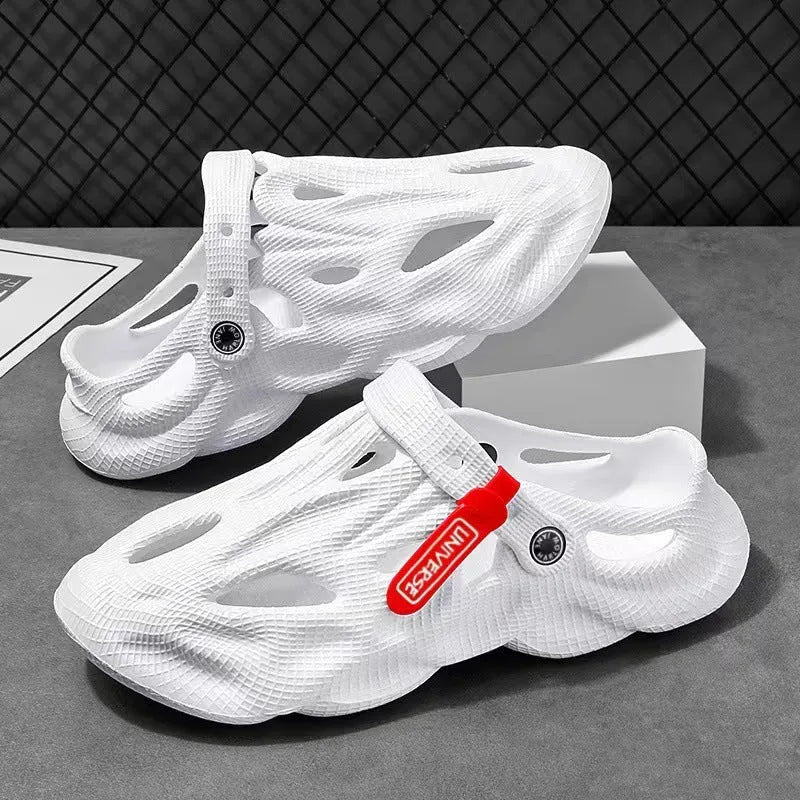 EVA foam coconut slippers with closed toe design and ventilation holes in grey colour