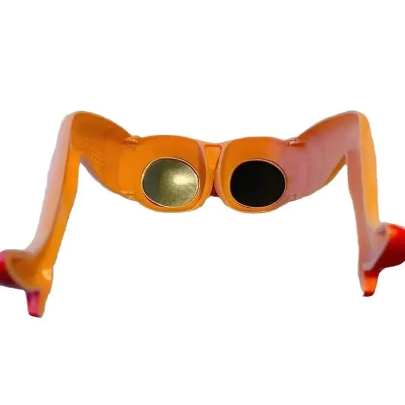 Orange plastic novelty sunglasses with leg and hip design measuring 15x20cm