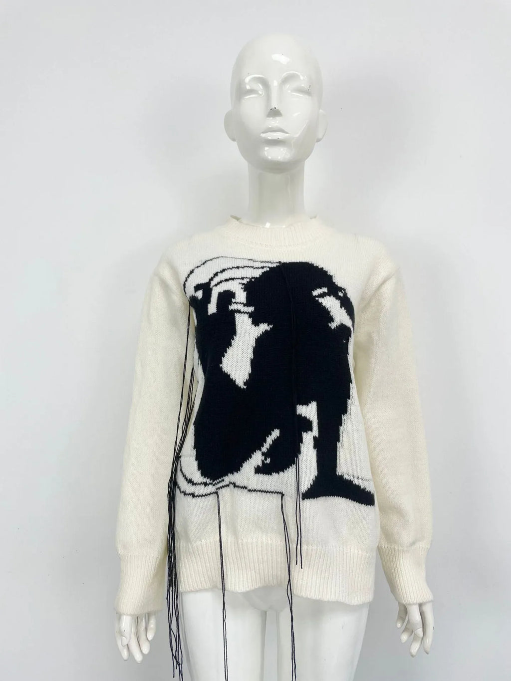 Women's grey alpaca wool sweater with abstract tassel design and round neck