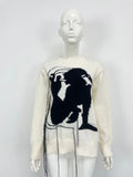 Women's grey alpaca wool sweater with abstract tassel design and round neck
